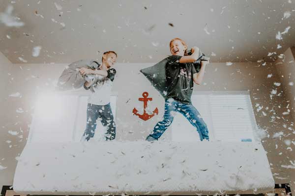 happy-healthy-kids-pillow-fight kids experiencing active benefits of healthy eating in early childhood